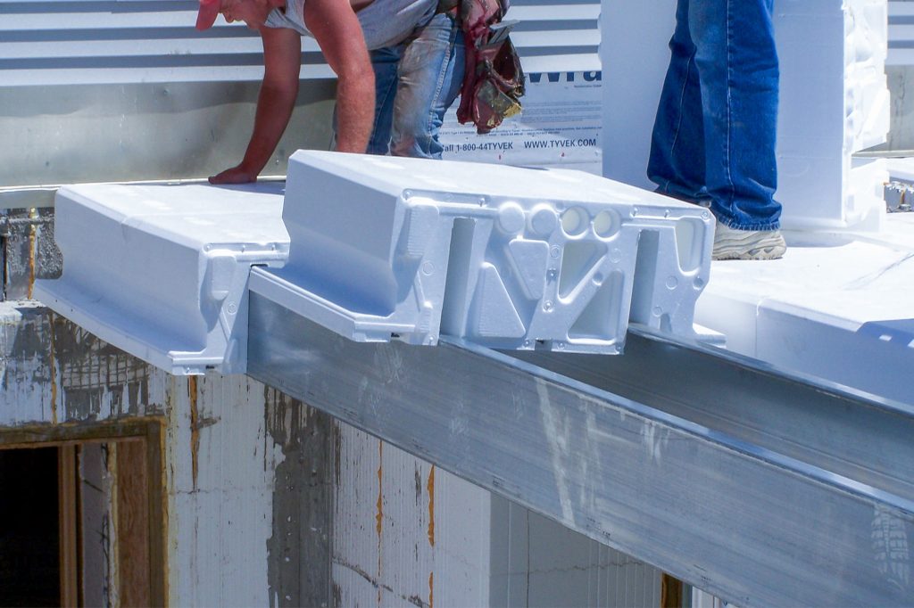 AmDeck Pro EPS roof forms with steel C-channel joists during installation