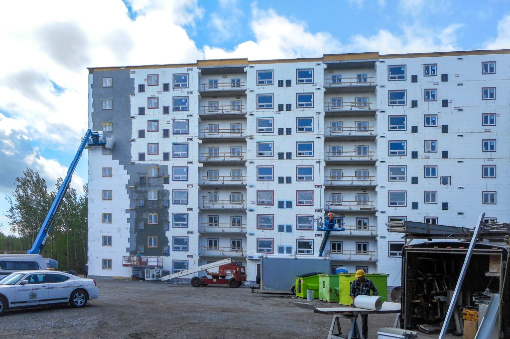 Exterior of the Ontario Finnish Rest Home showing commercial ICF construction across the nine-storey apartment building