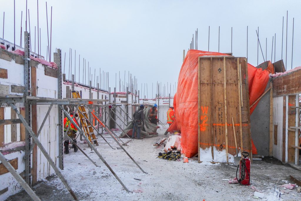 Commercial ICF construction crew working on Amvic™ ICF walls at the Ontario Finnish Rest Home project