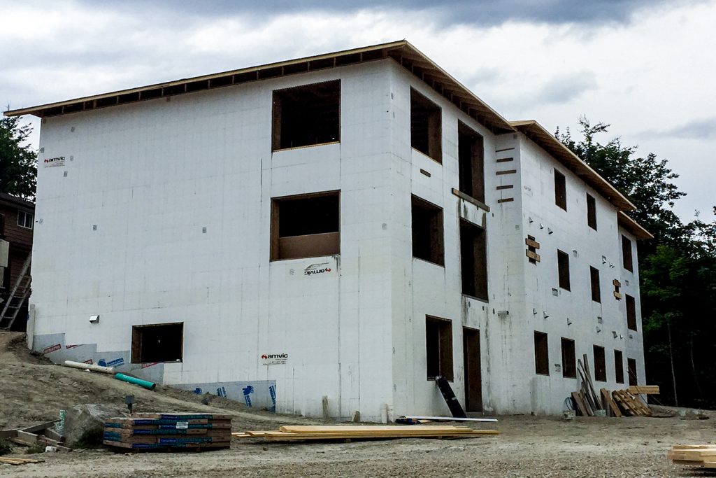 Three-storey Orchard Park Terrace condominium building under construction with Amvic™ ICF walls.