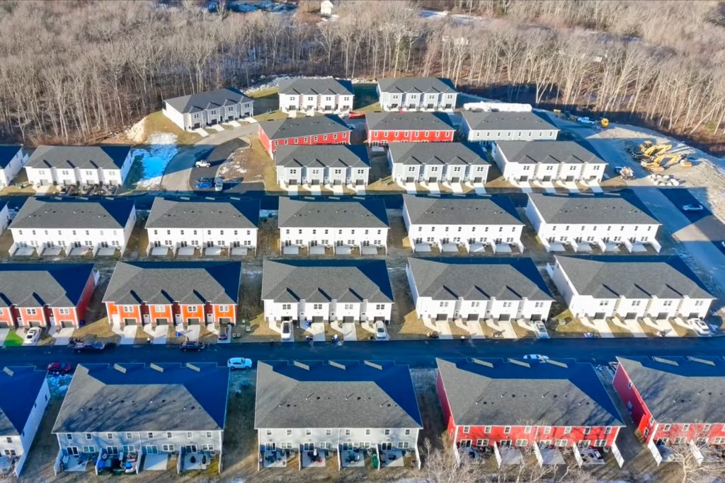 Aerial view of Boulder Farms Townhomes in Johnston, Rhode Island, showing completed multifamily buildings constructed with Amvic™ ICF.