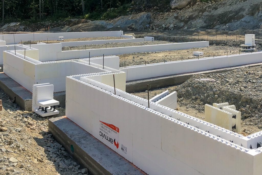 Amvic™ ICF walls under construction at Boulder Farms Townhomes in Johnston, Rhode Island, including concrete separation walls between units.