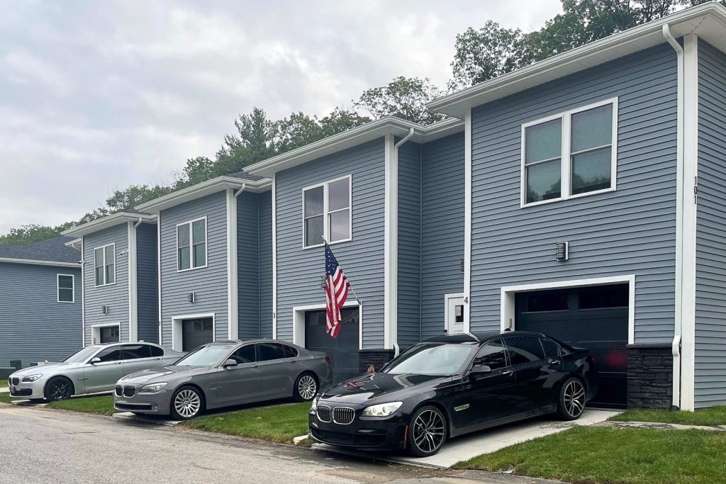 Row of completed Boulder Farms Townhomes fourplexes in Johnston, Rhode Island, constructed with Amvic™ ICF.