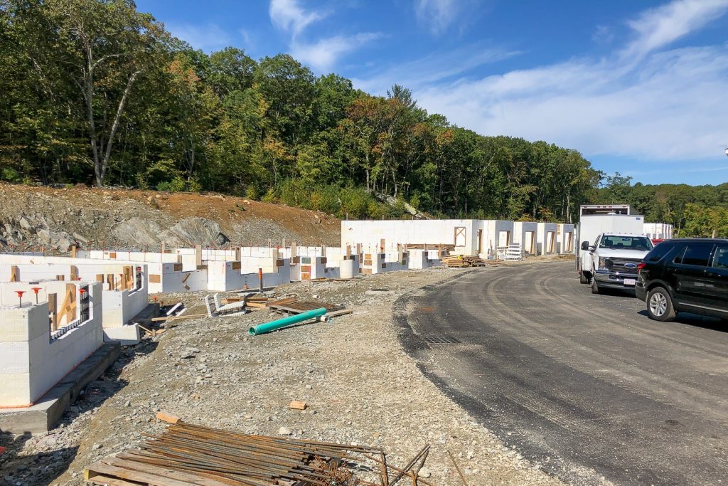 First courses of Amvic™ ICF blocks installed across multiple Boulder Farms Townhomes buildings during construction.